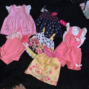 6-9 month -4 dresses 1 romper and 1 body suit